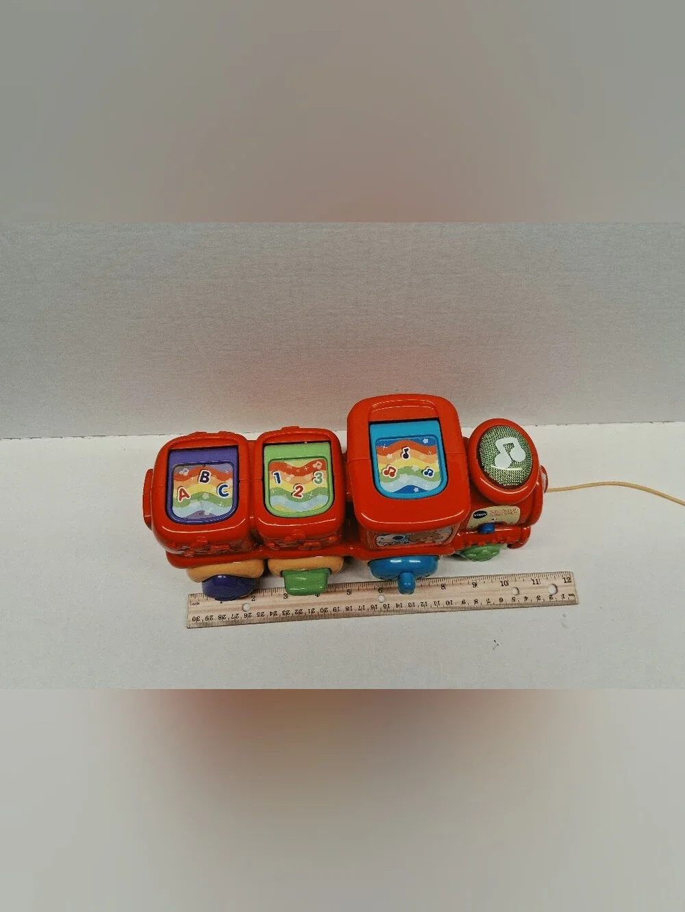 Red Pull-Along Animal Train Toy with Interactive Shapes